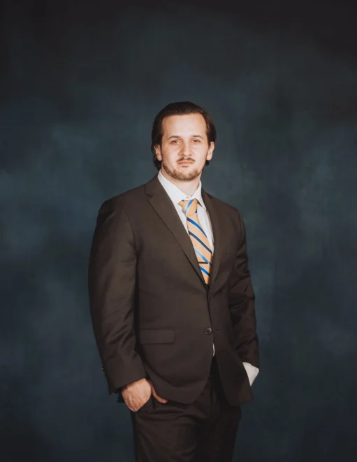 Robert Mazzola, attorney at Appelblatt Mazzola LLP, standing in a professional studio portrait