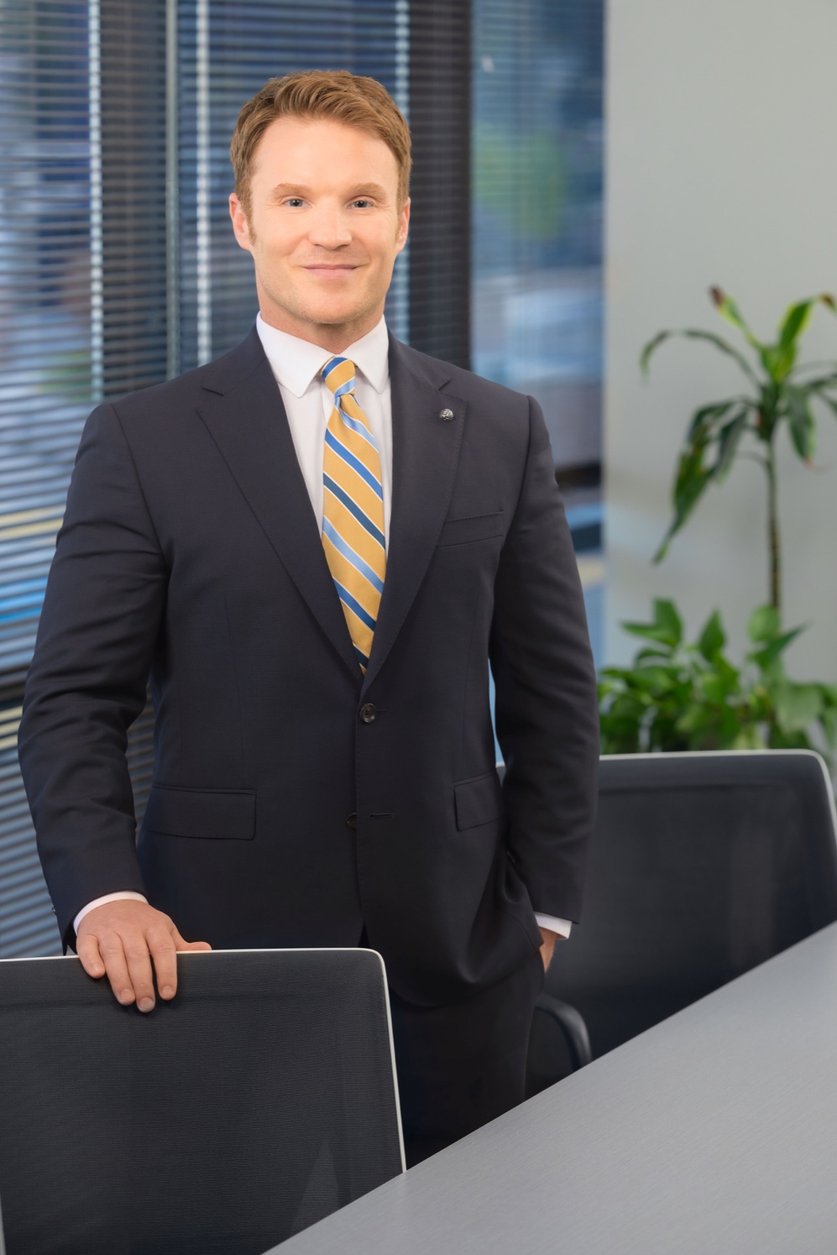 Damon T. Appelblatt standing in the office